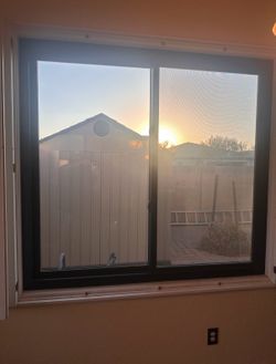 Andersen 100 Series Sliding Window – Dark Bronze
