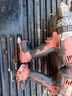 2 Milwaukee cordless drills