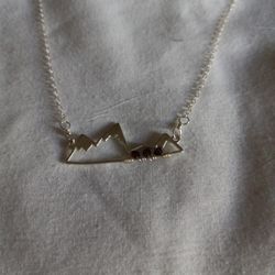 Necklace With Mountains And Garnet Stones It Says It's Marked As Sold But It's Not