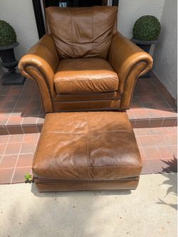 Free brown leather chair with ottoman
