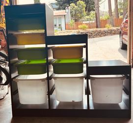 Kids storage shelf with bins