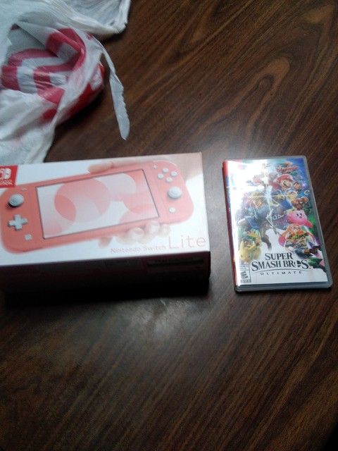 Nintendo switch, Coral,200.00 Hardly Used