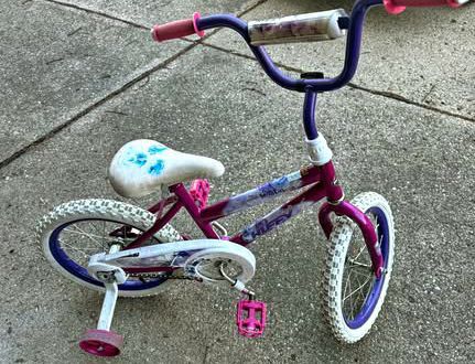 Girls Huffy Brand Bike With With Training Wheels