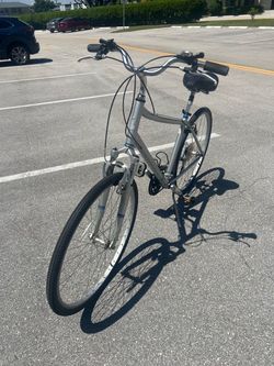 Men’s Large - Raleigh Hybrid Comfort bike, Quick Release Seat & Wheels. Front Shocks