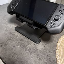 Nintendo Switch. With Upgraded Controllers 