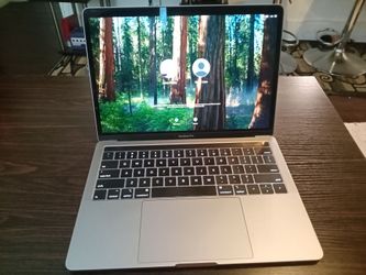 MacBook Pro with case and stand