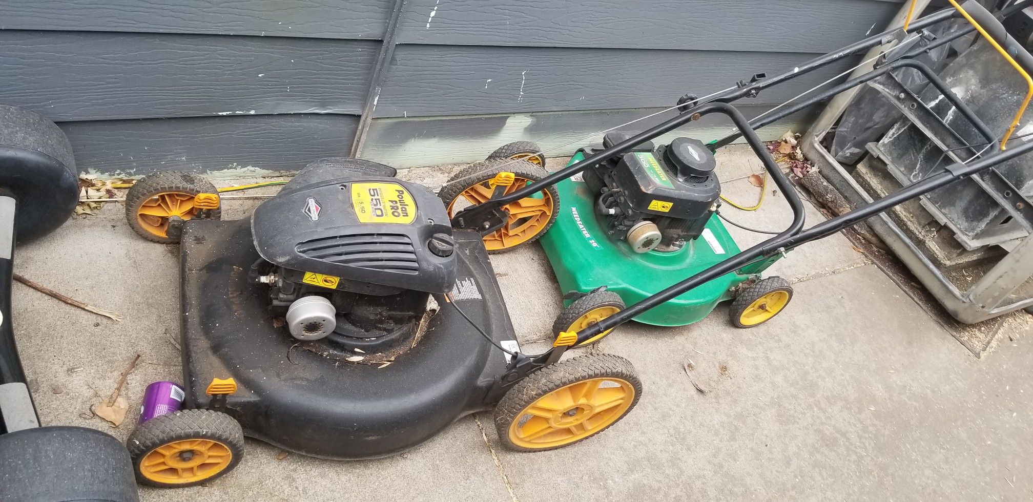 Lawn mowers both together