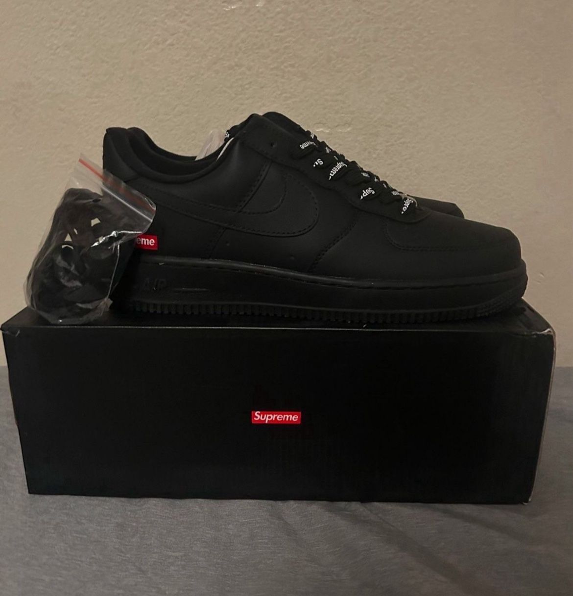All black Nike Supreme Air Forces