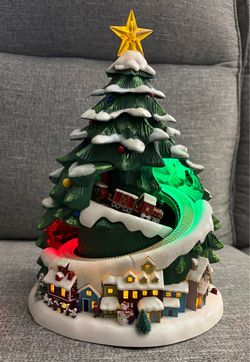 Vintage Avon Lighted Christmas Holiday Tree with Train released around 2007