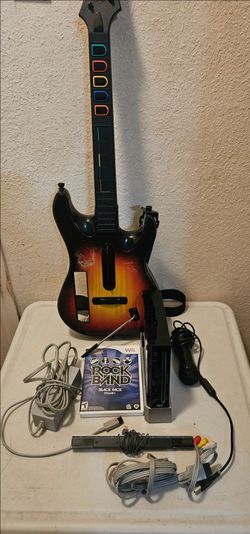 Nintendo Wii Console Bundle with Guitar and Rock Band