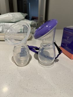 Haakaa and Lansinoh silicone suction breast pump