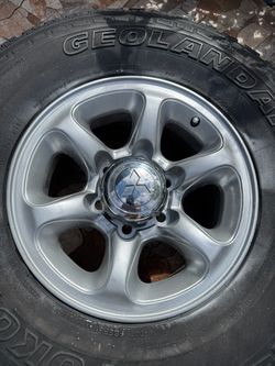 Mitsubishi Montero OEM 15" Rims Wheels 6 Lug + 265/70R15 Tires - Set of 4