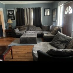Grey and black sectional With Ottoman And Swivel Chair 