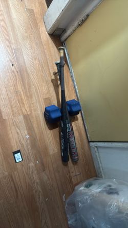 Baseball Bat, And A 30 Pound Dumbbell
