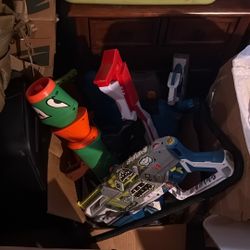 Box of Nerf guns 
