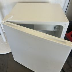 This is an IKEA TILLREDA 43 l freestanding white fridge