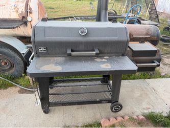 Barbecue grill smoker