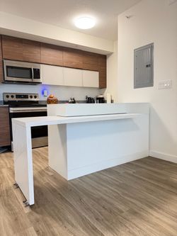 Portable white kitchen island