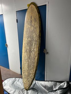 Selling my Tim Stamps Surfboards "Deviled Egg" model. 7'2" x 21" x 2 7/8" Custom Tim Stamps shape Beautiful yellow resin tint rails Includes fins Grea