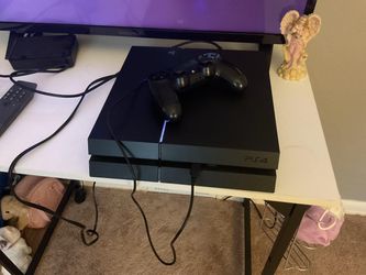 Sony PlayStation 4 Console with Controller