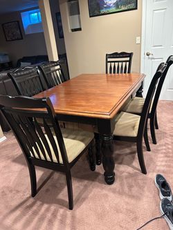 Dining table -6 chairs and also has leaf to expand