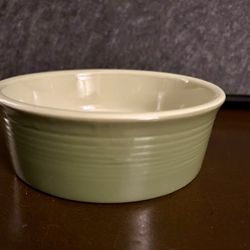 Waterproof mat w/raised edge & green ceramic bowl