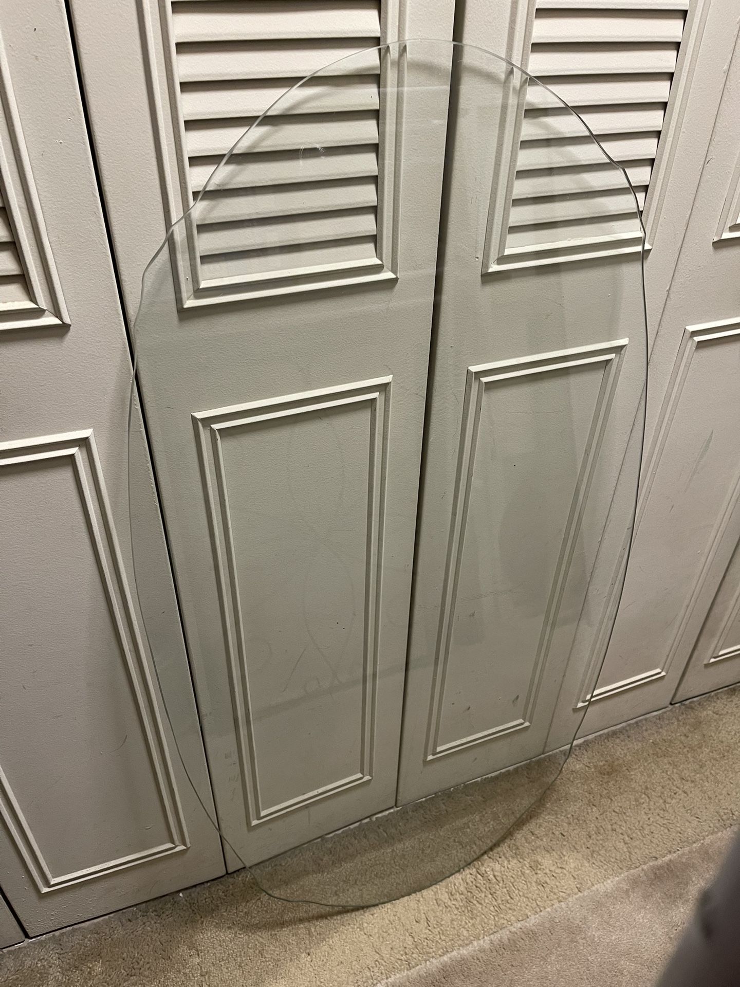 Large (46.5"L x 24.25"W), Heavy (approx 40 lbs.), Wave-Edge CLEAR GLASS TABLETOP - posted price is firm.