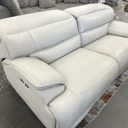 Like New Leather Electric Dual Reclining Couch With Electric Headrests And Dual USB 