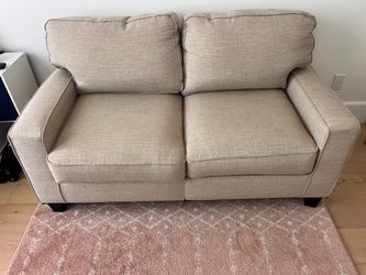 Beige loveseat