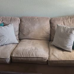 Gray Sofa, Gray Loveseat, And Coffee Table