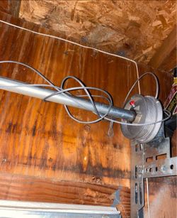 Garage door cable's off