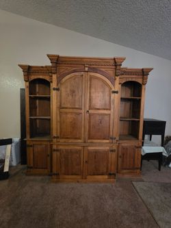 Beautiful solid carved wood entertainment center / display cabinet