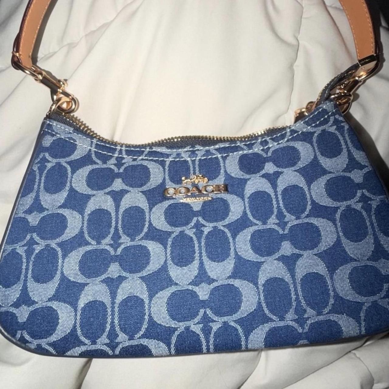 in signature blue coach shoulder bag