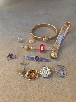 Assortment pins clips Fire dept. memorabilia