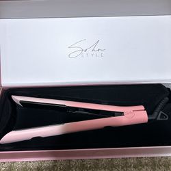 Flat hair straightener