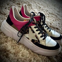 Golden Goose Superstar with leopard star, silver glitter, and hot pink laces