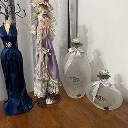 Jewelry holder, display bottles and doll