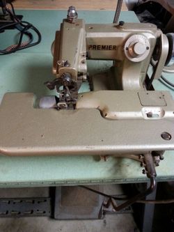Sewing heming machine
