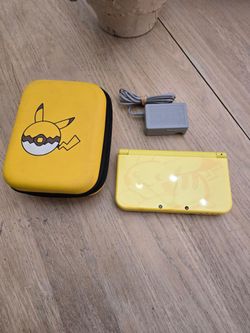 $700 - New Nintendo 3DS XL Pikachu Edition w/ Charger, Stylus, Case, 64GB SD Card & Digital Games