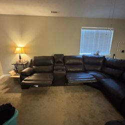 Leather sectional w/two storage bins