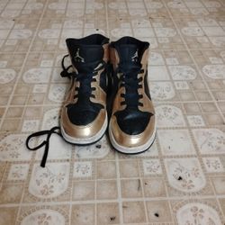 Gold Jordan 1 high Retros 