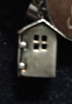 Silver birdhouse charm