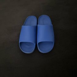 blue nike slides