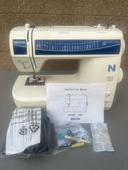 Necchi Model 7020 sewing machine along with its original instruction manual, foot controller pedal, New