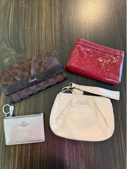 Coach wallets prices on description