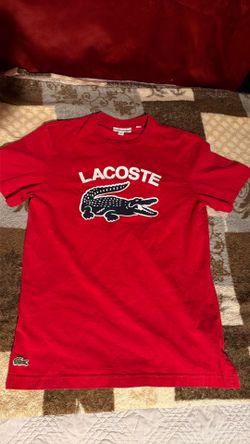 Red Lacoste shirt