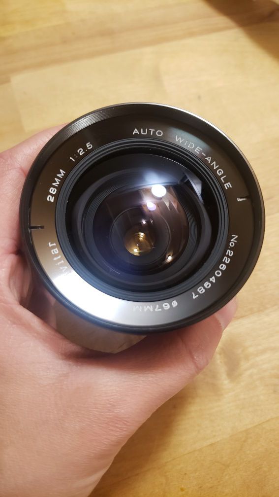 Like-new 28mm Vivitar camera lens