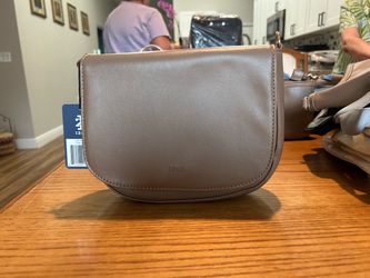 Izod tan saddle bag