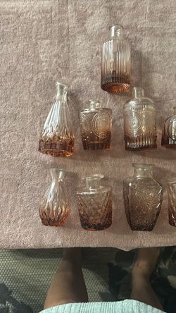 9 pink mini vases