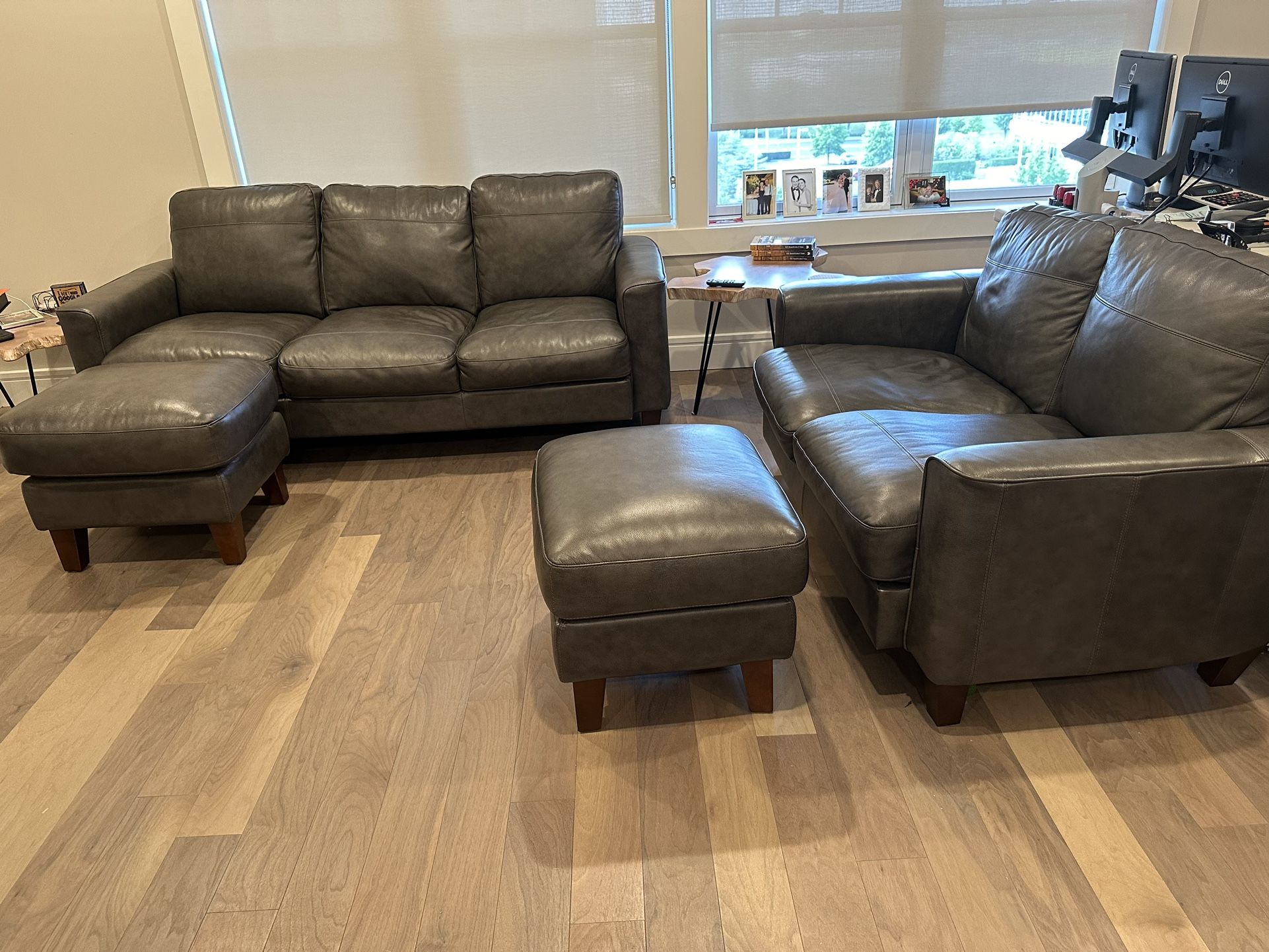 Hoffman Koos leather Couch, Love Seat And 2 Ottomans.